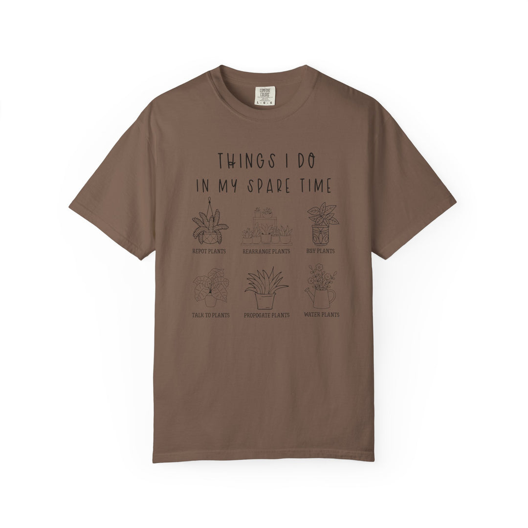 Plants Spare Time Tee featuring playful plant-lover design with six labeled icons: Repot, Rearrange, Buy, Talk, Propagate, Water Plants. Short-sleeve, relaxed fit, durable stitching.