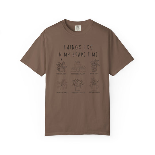 Plants Spare Time Tee featuring playful plant-lover design with six labeled icons: Repot, Rearrange, Buy, Talk, Propagate, Water Plants. Short-sleeve, relaxed fit, durable stitching.