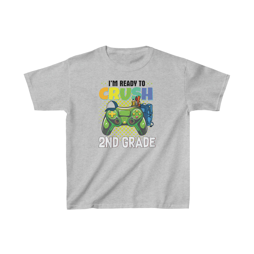 Grey t-shirt featuring a game controller design, ideal for kids. Made of 100% cotton with twill tape shoulders for durability. Classic fit, tear-away label, perfect for everyday wear.