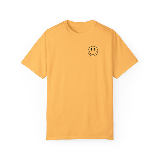 A relaxed fit God Day to Have a Good Day Tee in yellow, featuring a black smiley face design. Made of 100% ring-spun cotton with double-needle stitching for durability and a seamless look.