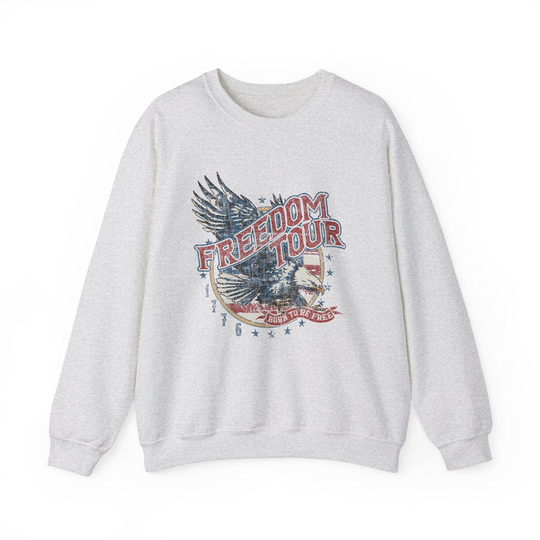 A white crewneck sweatshirt featuring an American Freedom Crew design. Unisex heavy blend fabric for comfort, ribbed knit collar, and no itchy side seams. Ideal for all occasions.