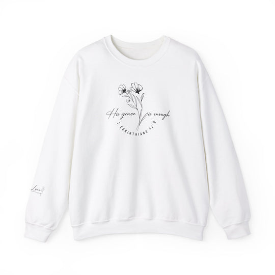 A white crewneck sweatshirt with a flower design, featuring a classic fit and ribbed knit collar for comfort. Made from a blend of 50% cotton and 50% polyester, this cozy sweatshirt is ideal for colder months. Double-needle stitching ensures durability, while the tear-away label adds a touch of luxury. Crafted ethically with 100% US cotton.