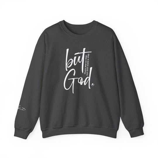 A unisex heavy blend crewneck sweatshirt featuring the But God Crew design. Made of 50% cotton and 50% polyester, with ribbed knit collar and double-needle stitching for durability. Ethically grown US cotton used.