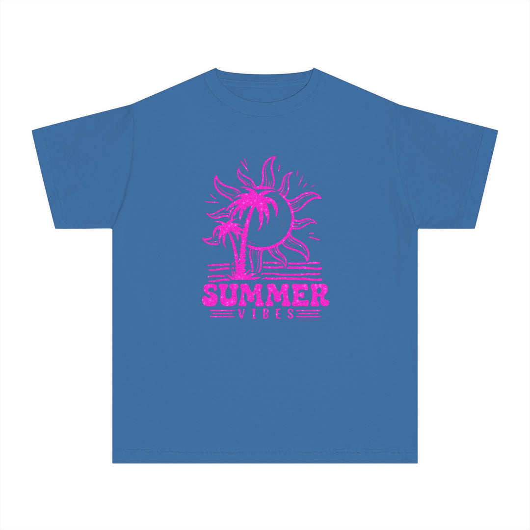 A kid's tee featuring a blue shirt with a pink sun and palm tree design. Crafted from 100% combed ringspun cotton for comfort and agility. Perfect for active days. Summer Vibes Kids Tee by Worlds Worst Tees.