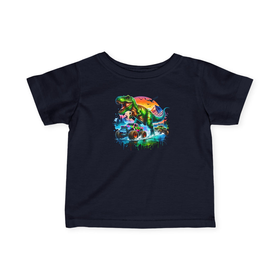 Dino Truck Baby Tee: Navy blue children’s T-shirt featuring a vibrant neon-style graphic of a green T. rex with colorful monster trucks and a graffiti-inspired sunset background.