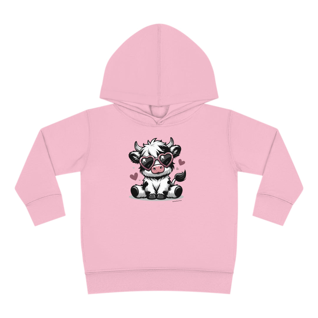 Cute Cow Toddler Hoodie with cartoon cow wearing sunglasses. Jersey-lined hood, cover-stitched details, side seam pockets for durability and coziness. Ideal for kids' comfort and play.