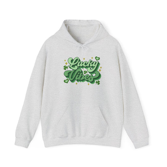 Good Day Lucky Day Hoodie in white, featuring green text with shamrocks and stars, made of a cotton-polyester blend with a kangaroo pocket and drawstring hood.