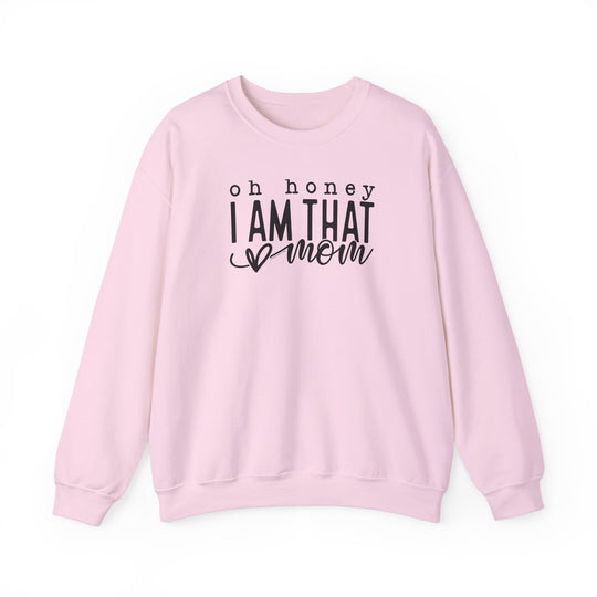 Unisex heavy blend crewneck sweatshirt, Oh Honey I'm that Mom Crew. Pink with black text. Ribbed knit collar, no itchy side seams. 50% cotton, 50% polyester. Medium-heavy fabric, loose fit.