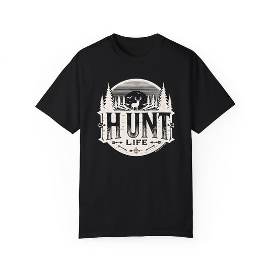A Hunt Life Tee, featuring a black shirt with white graphics of a deer, trees, and birds. Made of 100% ring-spun cotton, garment-dyed for coziness, with double-needle stitching for durability and a relaxed fit.