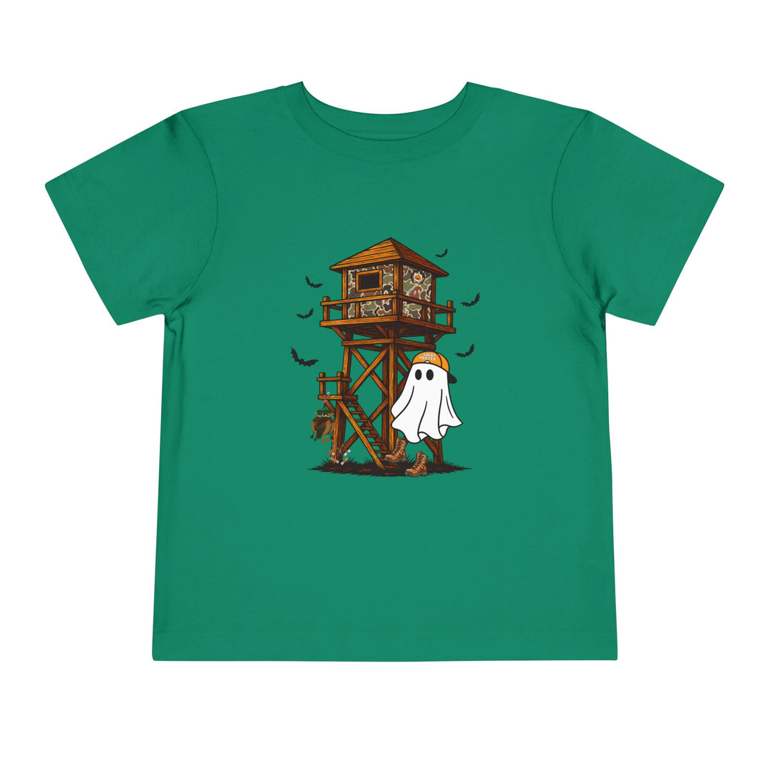 Ghost Hunter Toddler Tee featuring a deer-blind, cartoon ghost in an orange cap, and bats, combining spooky and hunting lodge themes on a playful green children's shirt.