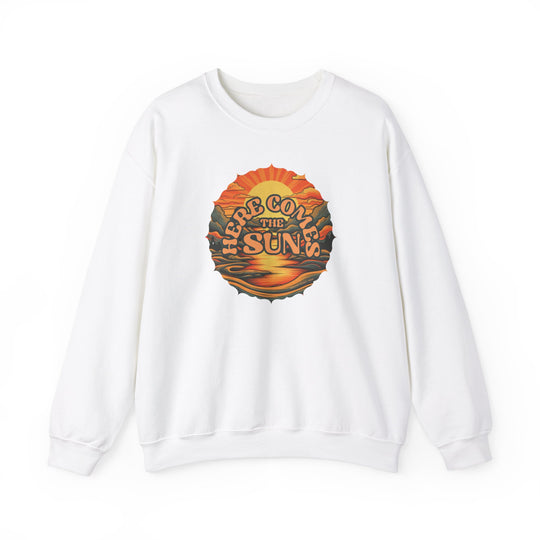 Unisex Here Comes the Sun Crew sweatshirt, white with graphic design of sunset and mountains. Cotton-polyester blend, ribbed knit collar, no itchy seams. Sizes S-5XL. Ideal comfort for all.