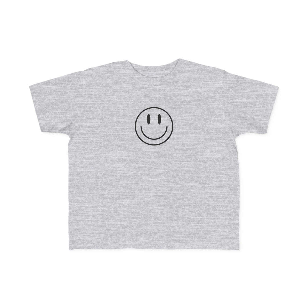 Toddler tee featuring a smiley face design, ideal for sensitive skin. Combed ring spun cotton, light fabric, tear-away label, and a classic fit. Good Day to Have a Good Day Toddler Tee from Worlds Worst Tees.
