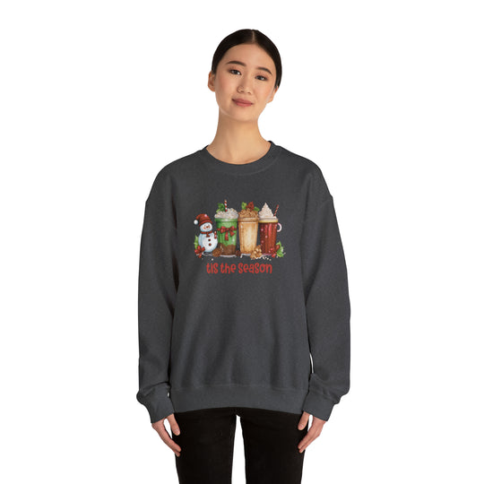 Unisex heavy blend crewneck sweatshirt, Tis the season Christmas Crew. Comfortable, ribbed knit collar, no itchy side seams. 50% cotton, 50% polyester, loose fit. Sizes S-5XL. Sewn-in label.