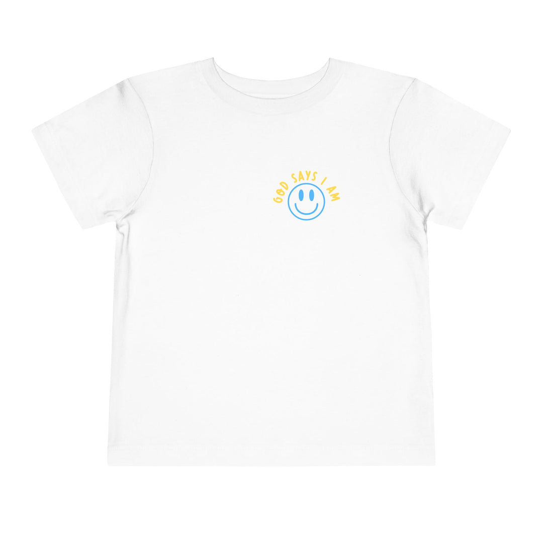 I AM Toddler Tee: A white, short-sleeved t-shirt featuring a blue smiley-face and GOD SAYS I AM in yellow on the chest. Made from soft, comfortable cotton.