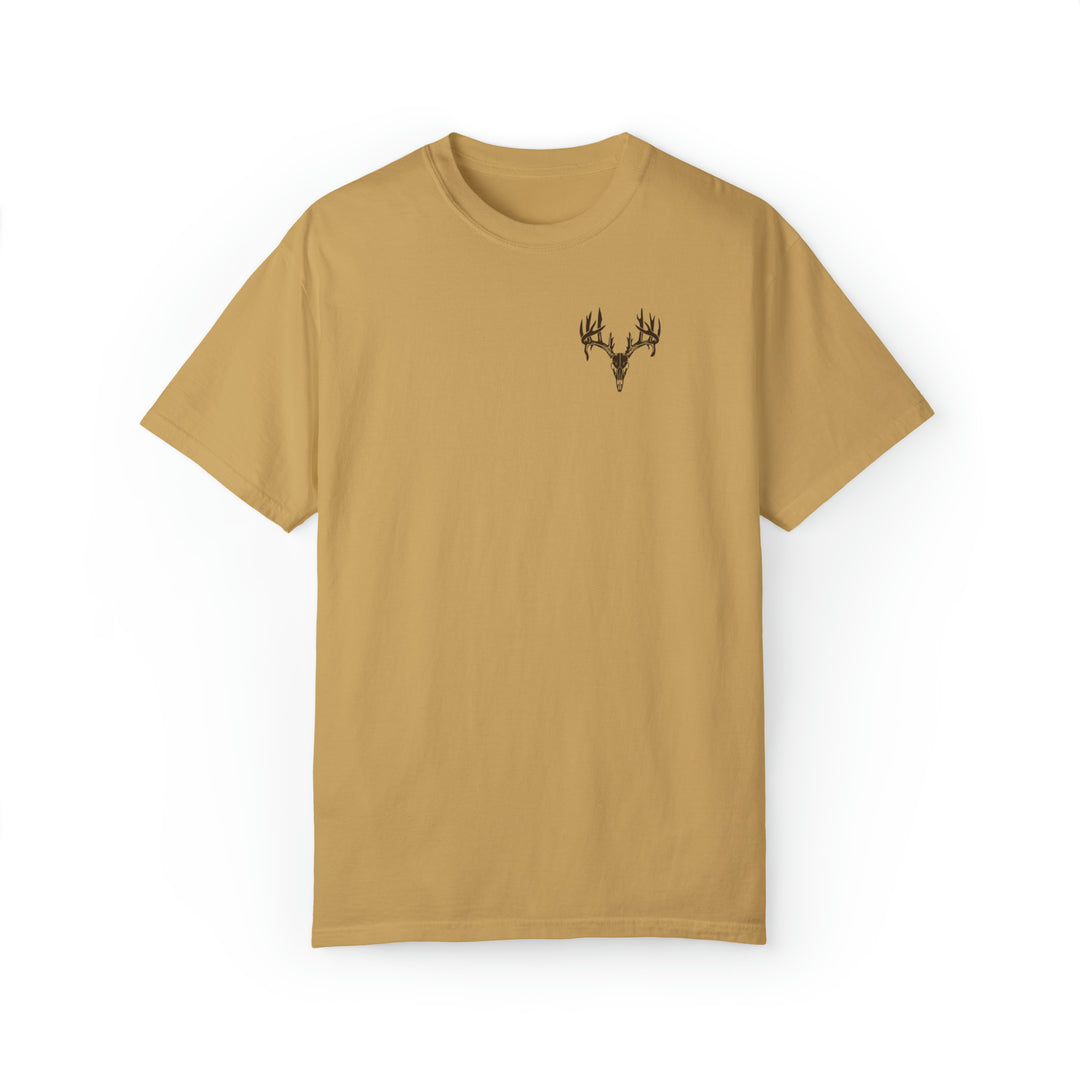 A tan t-shirt featuring a deer head design, part of the Tagged Out Tee collection by Worlds Worst Tees. Unisex, relaxed fit with ring-spun cotton and polyester blend.