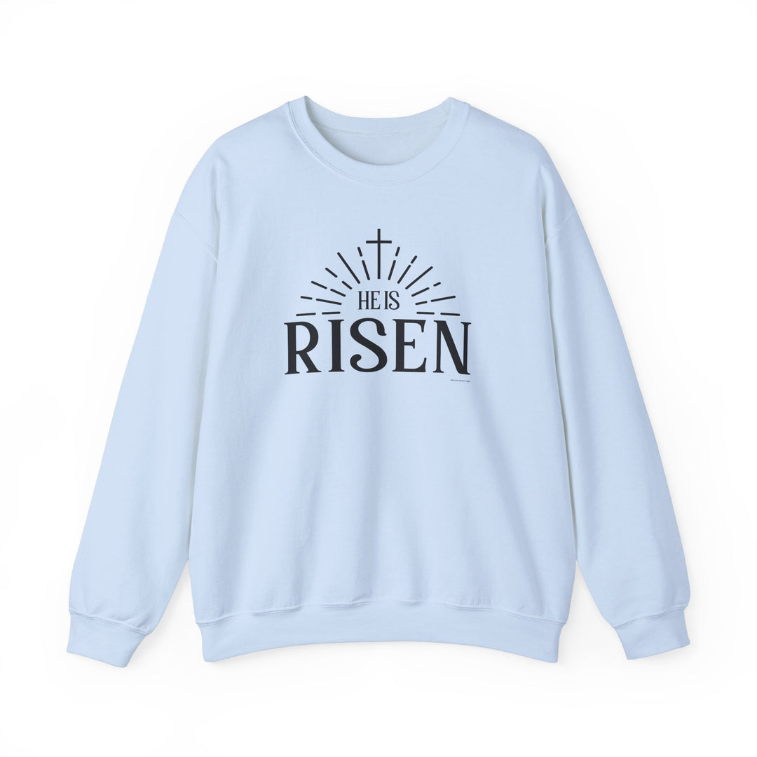 A unisex heavy blend crewneck sweatshirt featuring the He is Risen Crew design. Made of 50% cotton and 50% polyester, ribbed knit collar, and double-needle stitching for durability. No itchy side seams.