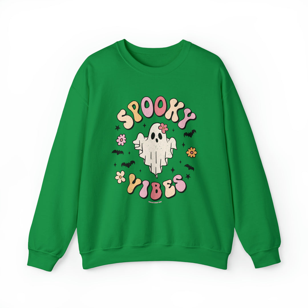 A green crewneck sweatshirt featuring a ghost and bats design. Unisex, heavy blend fabric for comfort. Ribbed knit collar, no itchy seams. Perfect for spooky vibes. From 'Worlds Worst Tees'.