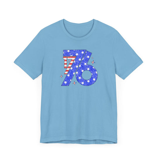 A blue 1776 Tee t-shirt with a number and stars, featuring a classic unisex jersey design with ribbed knit collars and taping on shoulders for a better fit over time. Made of 100% Airlume combed and ringspun cotton.