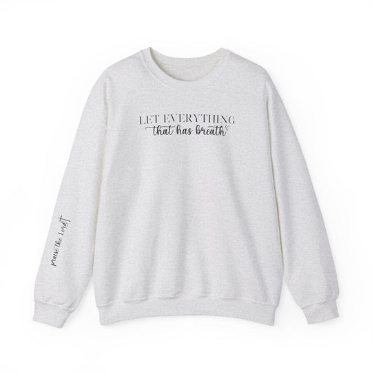 Unisex heavy blend crewneck sweatshirt featuring Let Everything That Has Breath Praise the Lord design. Medium-heavy fabric blend of 50% cotton and 50% polyester for cozy comfort. Ribbed knit collar, double-needle stitching for durability, tear-away label for itch-free wear. Ethically made with US cotton.