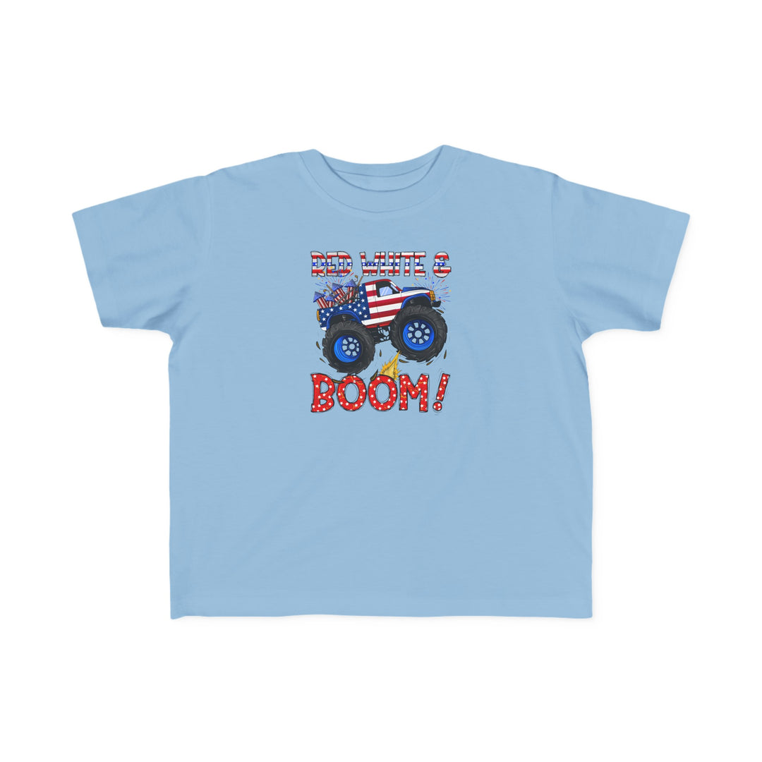 A Red White and Boom Toddler Tee featuring a blue shirt with a cartoon monster truck, perfect for sensitive skin. Made of 100% combed ringspun cotton, light fabric, tear-away label, and a classic fit.