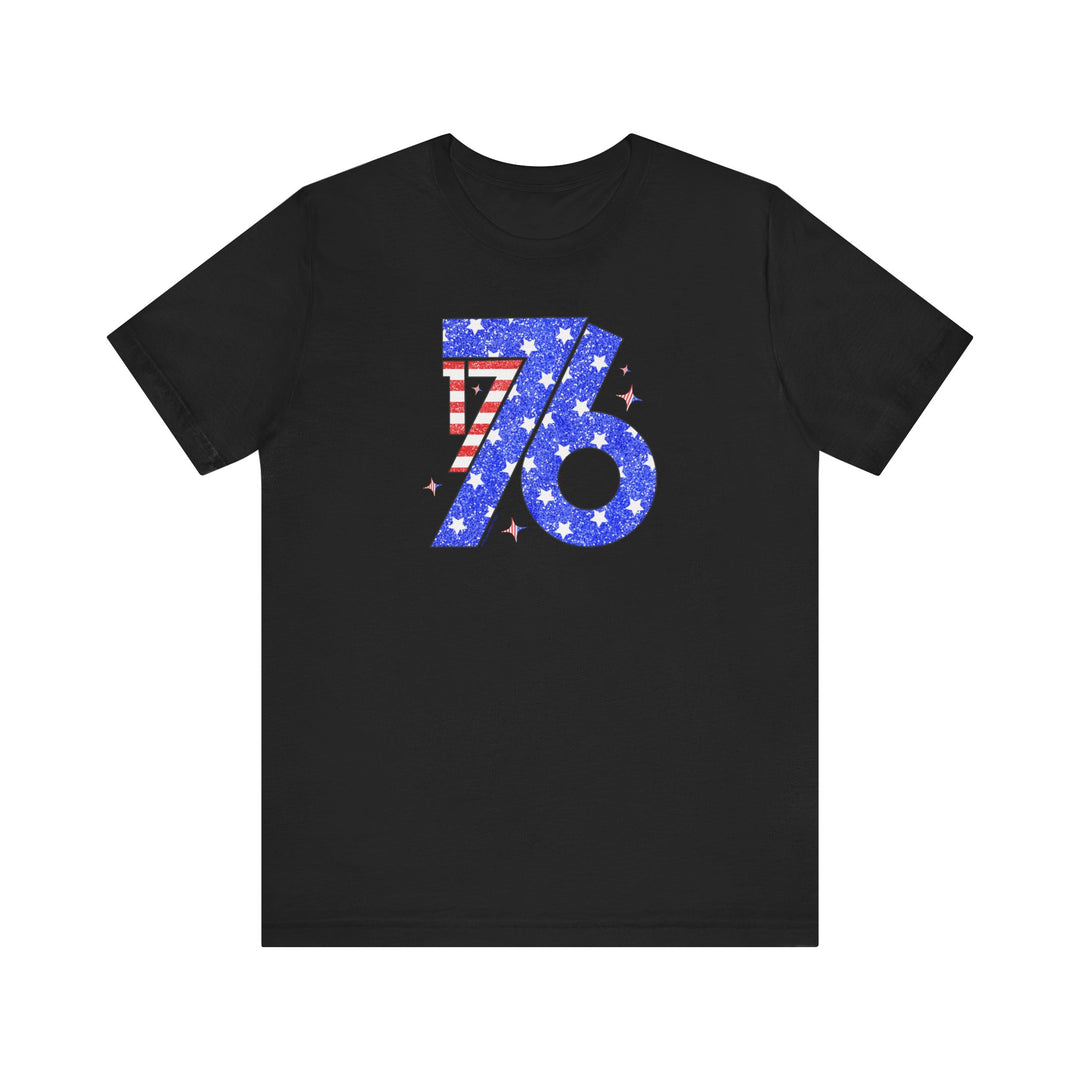 A black 1776 Tee with a red, white, and blue design, featuring a number and stars. Unisex jersey shirt made of 100% cotton, retail fit, with ribbed knit collars and taping on shoulders for durability.