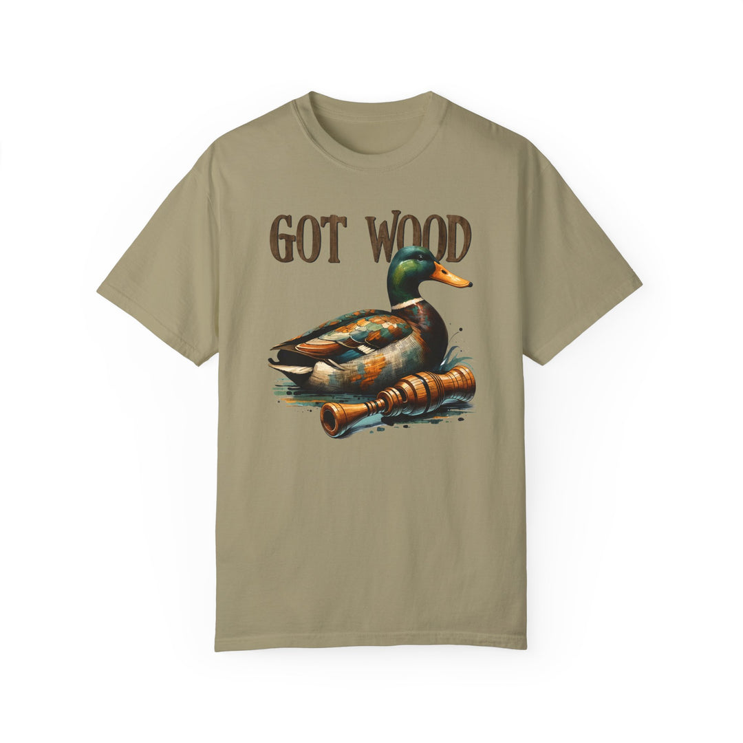 Alt text: Got Wood Tee: A relaxed-fit t-shirt featuring a duck graphic, made of 100% ring-spun cotton for coziness. Double-needle stitching ensures durability, while seamless design maintains shape. From Worlds Worst Tees.