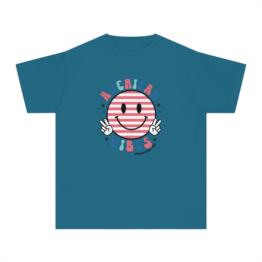American Vibes Youth Tee: Blue t-shirt with smiley face and cartoon hands, designed for kids' active days. 100% combed ringspun cotton, soft-washed, garment-dyed, and classic fit for all-day comfort.