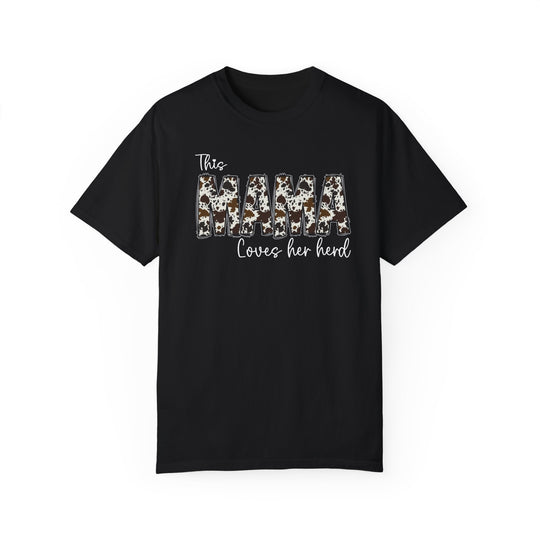 A black t-shirt with white text, featuring a Mama Herd Tee logo. Made of 100% ring-spun cotton, garment-dyed for extra coziness, with a relaxed fit and durable double-needle stitching. From Worlds Worst Tees.