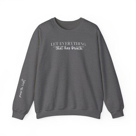 Unisex heavy blend crewneck sweatshirt featuring Let Everything That Has Breath Praise the Lord design. Made of 50% cotton, 50% polyester for comfort and durability. Classic fit with ribbed knit collar.