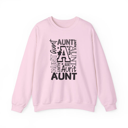 Relaxed fit Aunt Crew sweatshirt in pink with black text. 50% cotton, 50% polyester blend for comfort. Medium-heavy fabric, loose fit, true to size. Ideal for casual style.