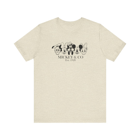 Mickey and CO Tee, a classic unisex short sleeve shirt with a ribbed crew neckline, designed for comfort and style with soft, breathable fabric.
