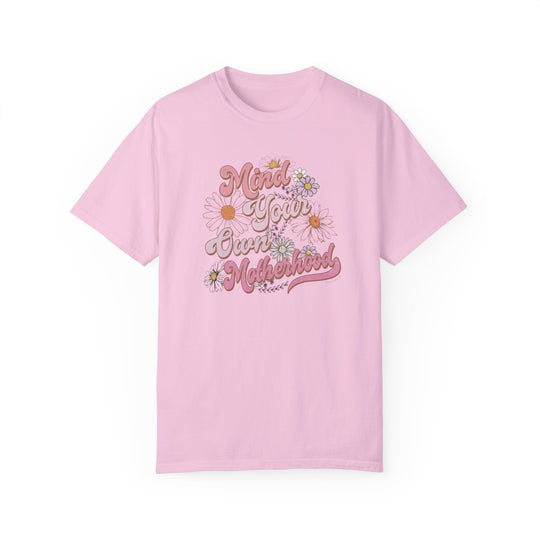 A pink Mind Your Motherhood Tee, garment-dyed with ring-spun cotton for coziness. Relaxed fit, double-needle stitching for durability, no side-seams for shape retention. Perfect for daily wear.