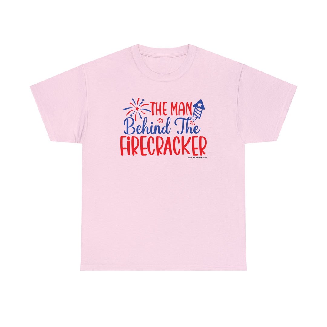Man Behind the Firecracker Tee: Unisex heavy cotton t-shirt with red and blue text on pink background. Classic fit, ribbed knit collar, no side seams. Ideal staple for casual fashion.