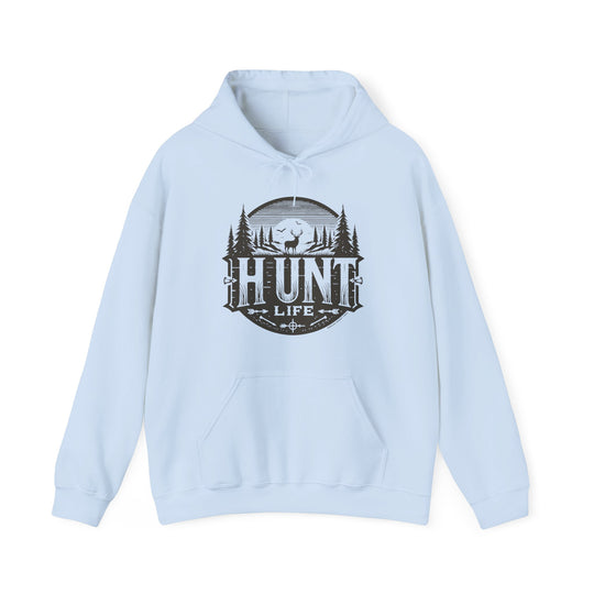 A light blue Hunt Life hoodie with a deer and trees logo on it. Unisex heavy blend hooded sweatshirt made of 50% cotton and 50% polyester, featuring a kangaroo pocket and drawstring hood. Classic fit, tear-away label, true to size.