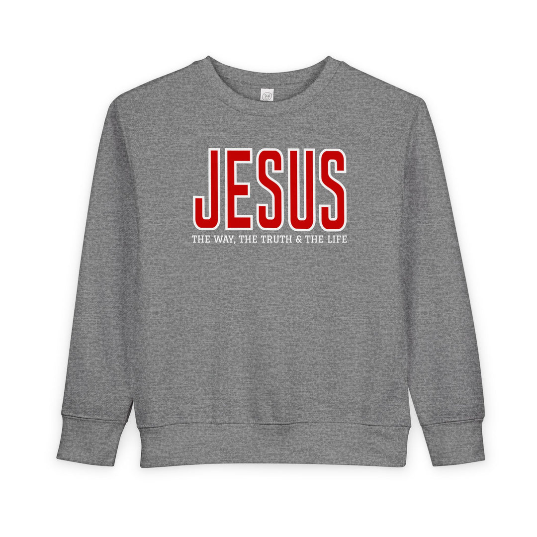 Heather-gray toddler crewneck sweatshirt featuring JESUS in bold red and THE WAY, THE TRUTH & THE LIFE in white. Cozy, durable, and CPSIA compliant.