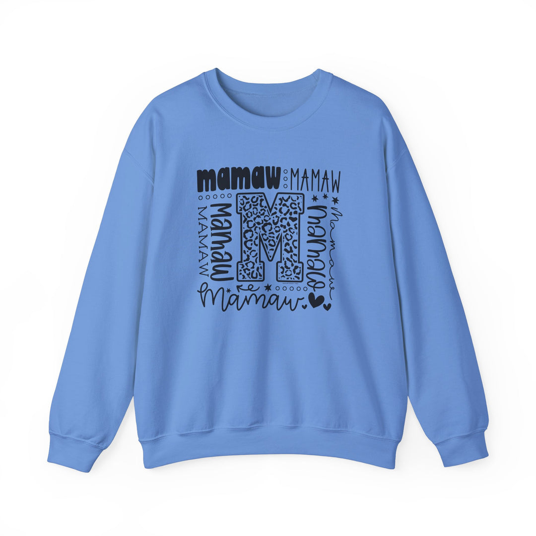 A cozy Mamaw Crew unisex sweatshirt in blue with a letter M design. Made from a blend of polyester and cotton, featuring ribbed knit collar and durable double-needle stitching. Ideal for colder months.