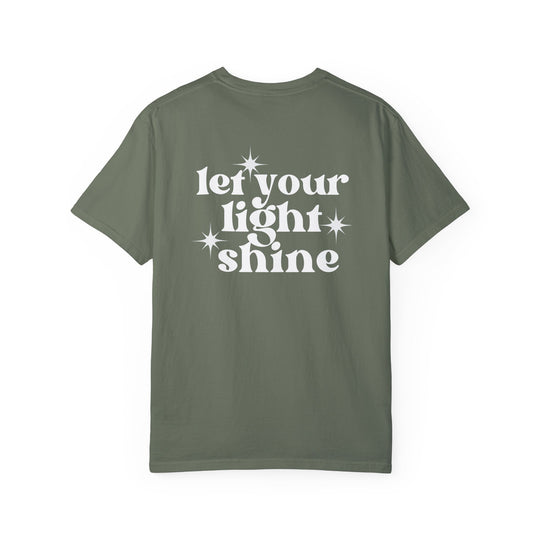 A relaxed fit Let Your Light Shine Tee, crafted from 100% ring-spun cotton, features a white star and cross design on the back. Garment-dyed for extra coziness, with double-needle stitching for durability.