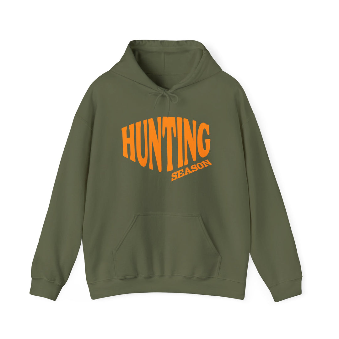Olive-green Hunting Season hoodie with orange lettering, kangaroo pocket, and drawstring hood, made of a cozy cotton-polyester blend.