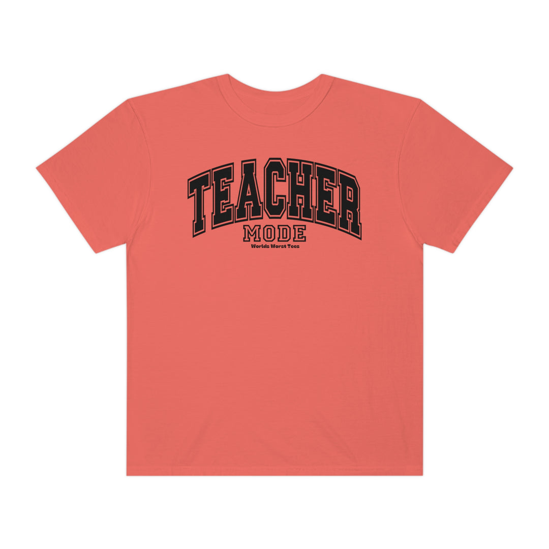 Unisex Teacher Mode Tee: A red shirt with black text, featuring a logo on the back. Made of 80% ring-spun cotton and 20% polyester, with a relaxed fit and rolled-forward shoulder. Sizes from S to 4XL.