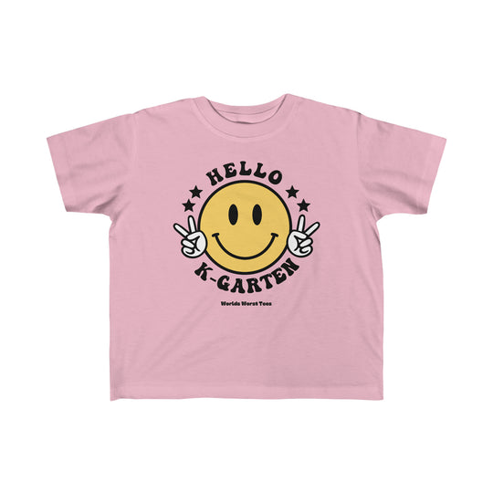 Hello Kindergarten Toddler Tee featuring a pink t-shirt with smiley face, peace signs, and a cartoon hand making a peace sign. Soft 100% combed ringspun cotton, light fabric, classic fit, tear-away label.
