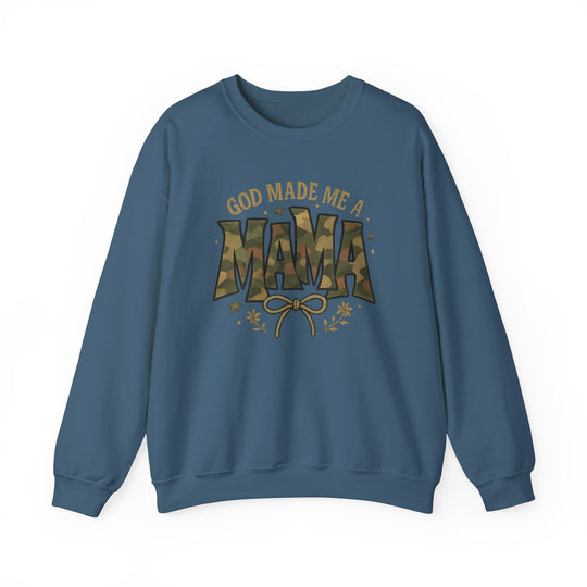 Blue crewneck sweatshirt with GOD MADE ME A MAMA graphic featuring camouflage-patterned MAMA, bow, foliage, and stars. Made from a cozy cotton-polyester blend.