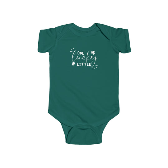 A green baby bodysuit with white text, featuring durable 100% cotton fabric with ribbed knitting for enhanced durability. Plastic snaps at the cross closure for easy changing access. Title: One Lucky Little Onesie.