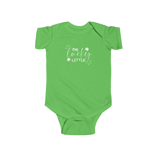 A green baby bodysuit with white text, featuring the title One Lucky Little Onesie. Made of 100% cotton, light fabric, with ribbed knit bindings for durability and plastic snaps for easy changing access. From Worlds Worst Tees.