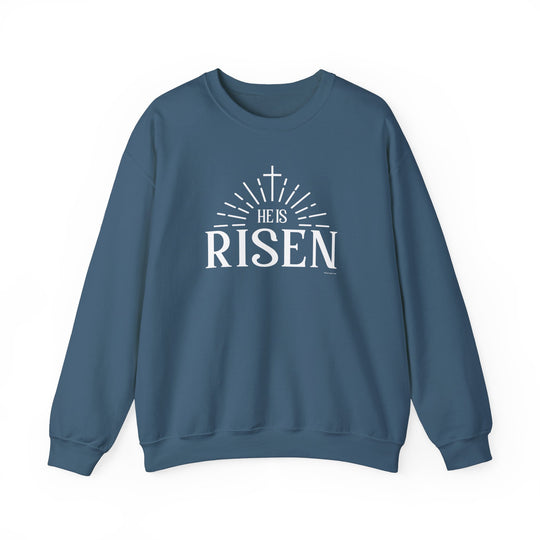 A unisex heavy blend crewneck sweatshirt, the He is Risen Crew, offers pure comfort with a ribbed knit collar and durable double-needle stitching. Made from 50% cotton and 50% polyester, this cozy sweatshirt is ideal for colder months.