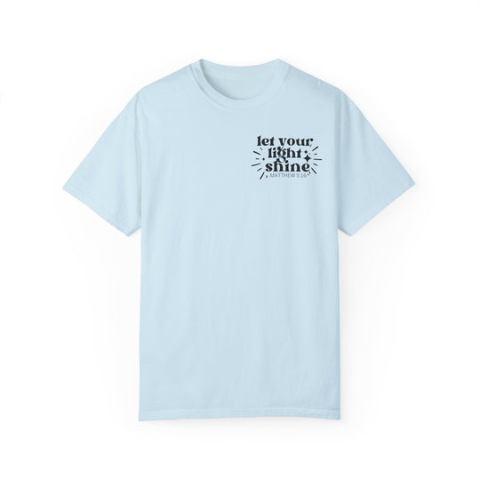Let Your Light Shine Tee: Light blue t-shirt with black text. 100% ring-spun cotton, garment-dyed for coziness. Relaxed fit, double-needle stitching for durability. No side-seams for a tubular shape.