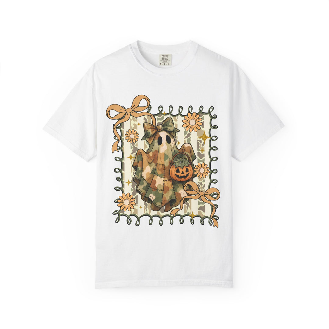 Quilted Ghost Tee featuring a camo-patterned ghost holding a jack-o’-lantern, framed by vine tendrils and daisies on a white T-shirt.