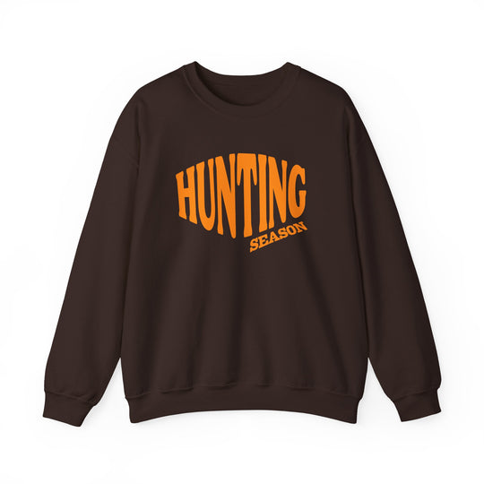Dark brown crewneck sweatshirt with HUNTING SEASON in bold orange font, combining style and comfort with a classic fit and durable stitching.