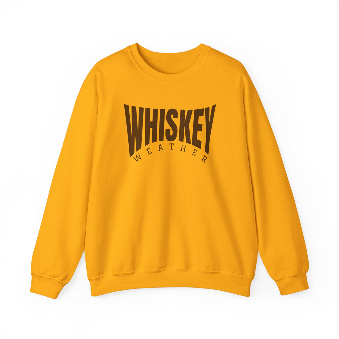 Mustard-yellow crewneck sweatshirt with WHISKEY WEATHER text, featuring long sleeves and ribbed details for comfort and durability, embodying Worlds Worst Tees' unique style.