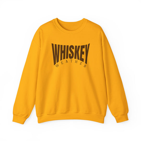 Mustard-yellow crewneck sweatshirt with WHISKEY WEATHER text, featuring long sleeves and ribbed details for comfort and durability, embodying Worlds Worst Tees' unique style.