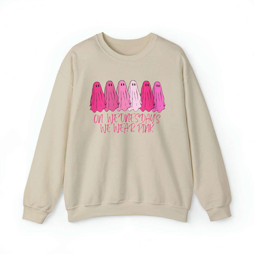 A white crewneck sweatshirt featuring pink ghosts, ideal for comfort and style. Unisex heavy blend fabric, ribbed knit collar, and no itchy side seams. Perfect for casual wear.